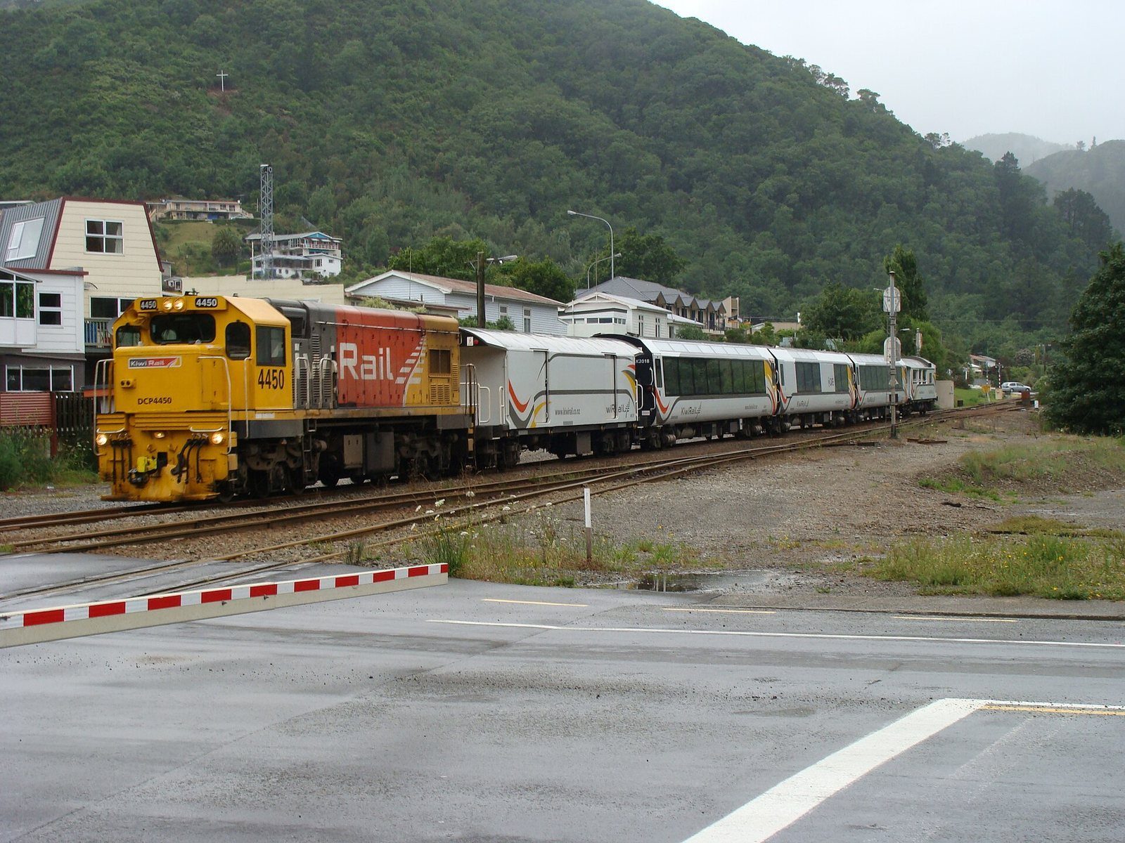A Coastal Pacific train crossing a street in Picton