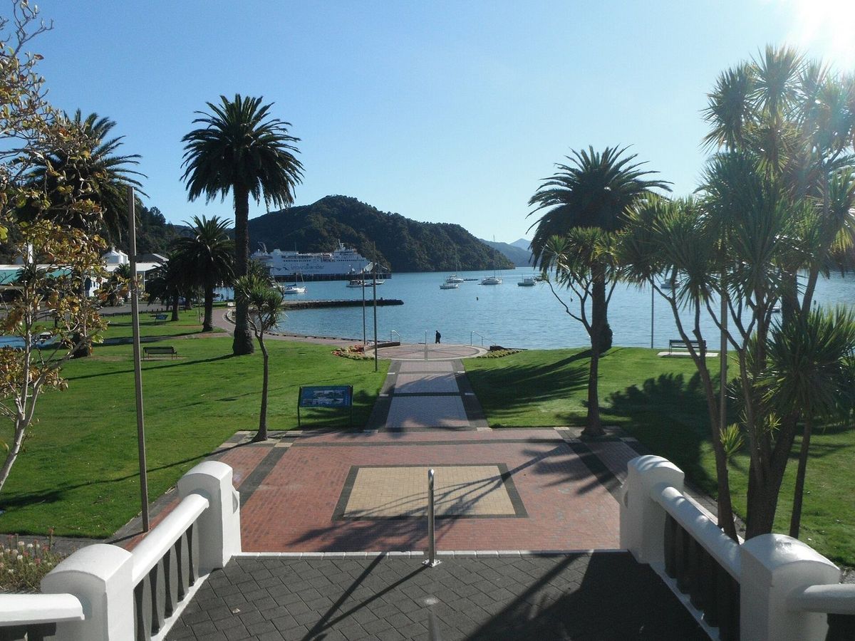 Picton's foreshore reserve and marina seen through the war memorial archway