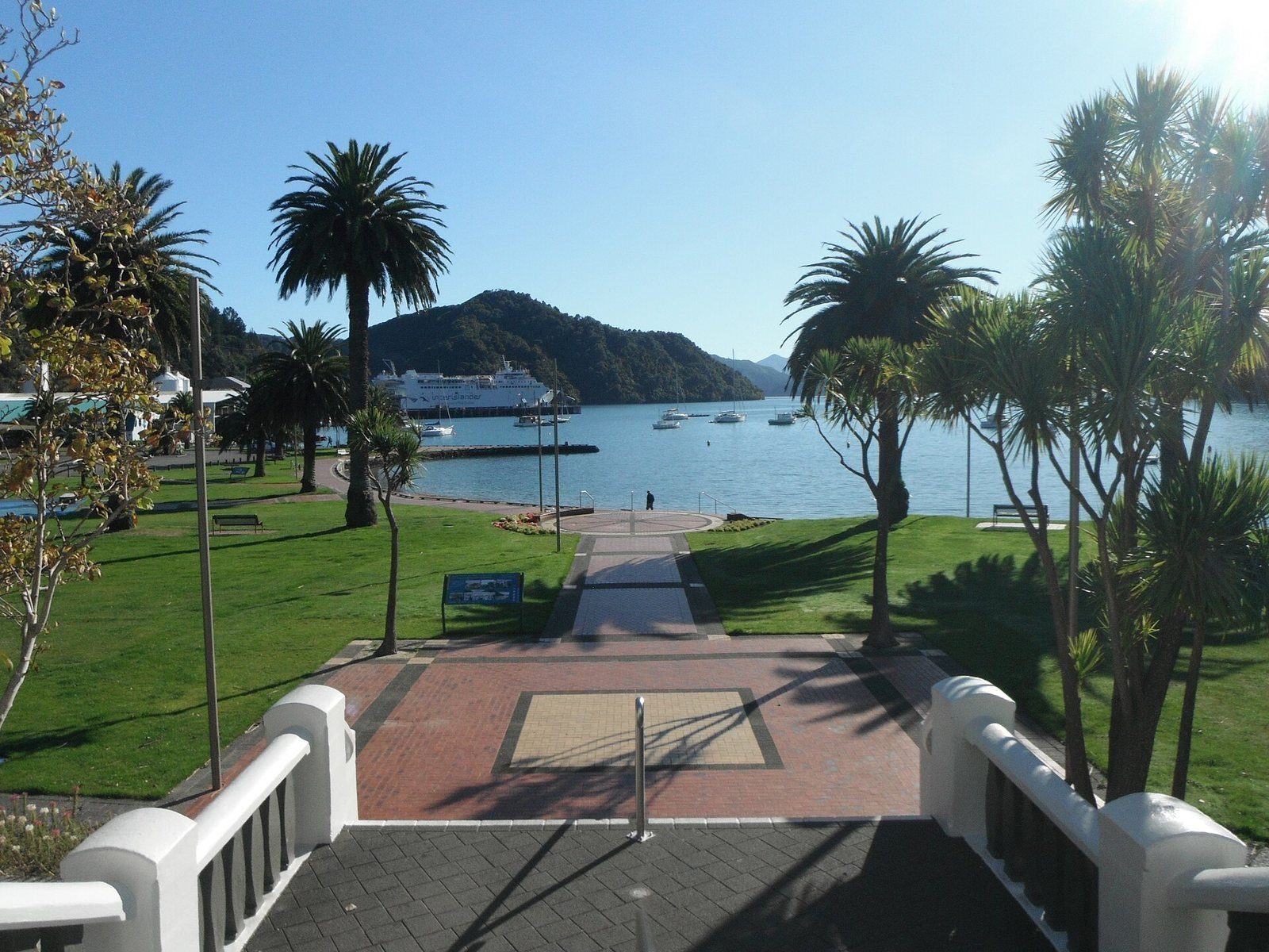 Picton's foreshore reserve and marina seen through the war memorial archway