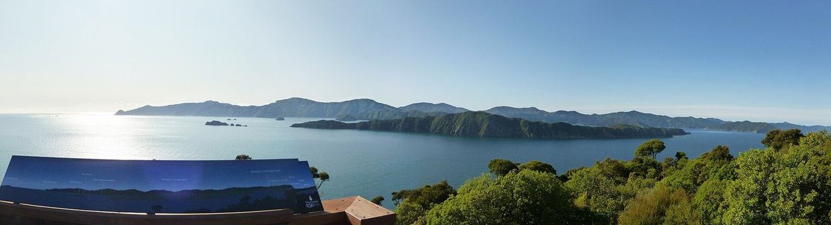 Long Island lying low and forested in Queen Charlotte Sound