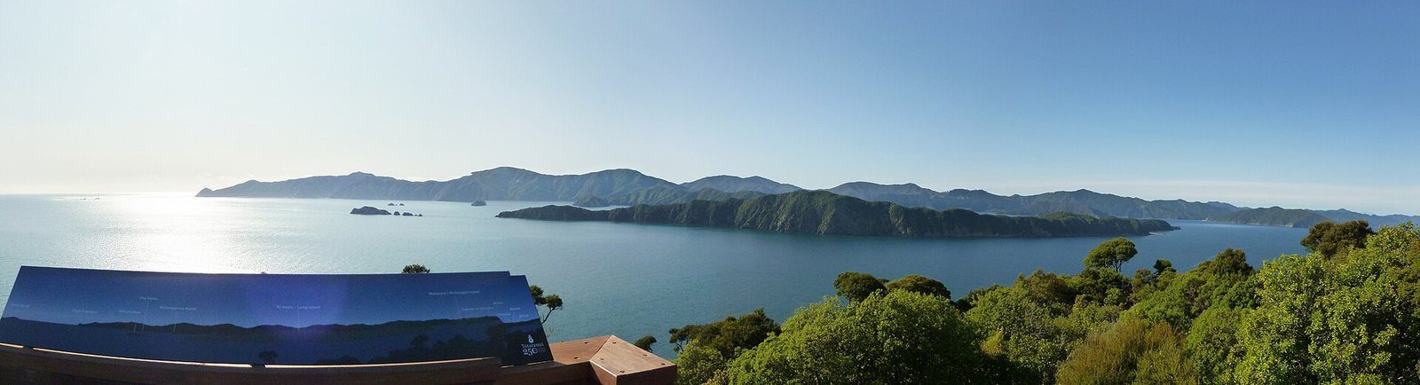 Long Island lying low and forested in Queen Charlotte Sound