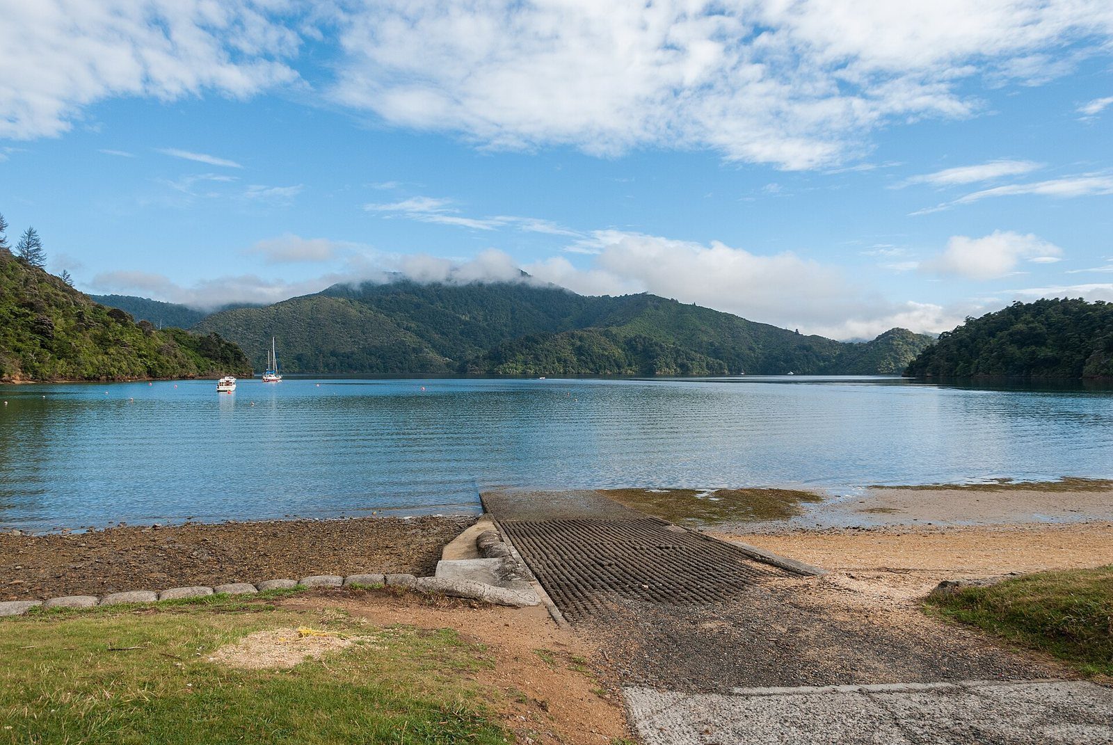 A calm bush-fringed bay with a beach at Ngakuta, Marlborough Sounds