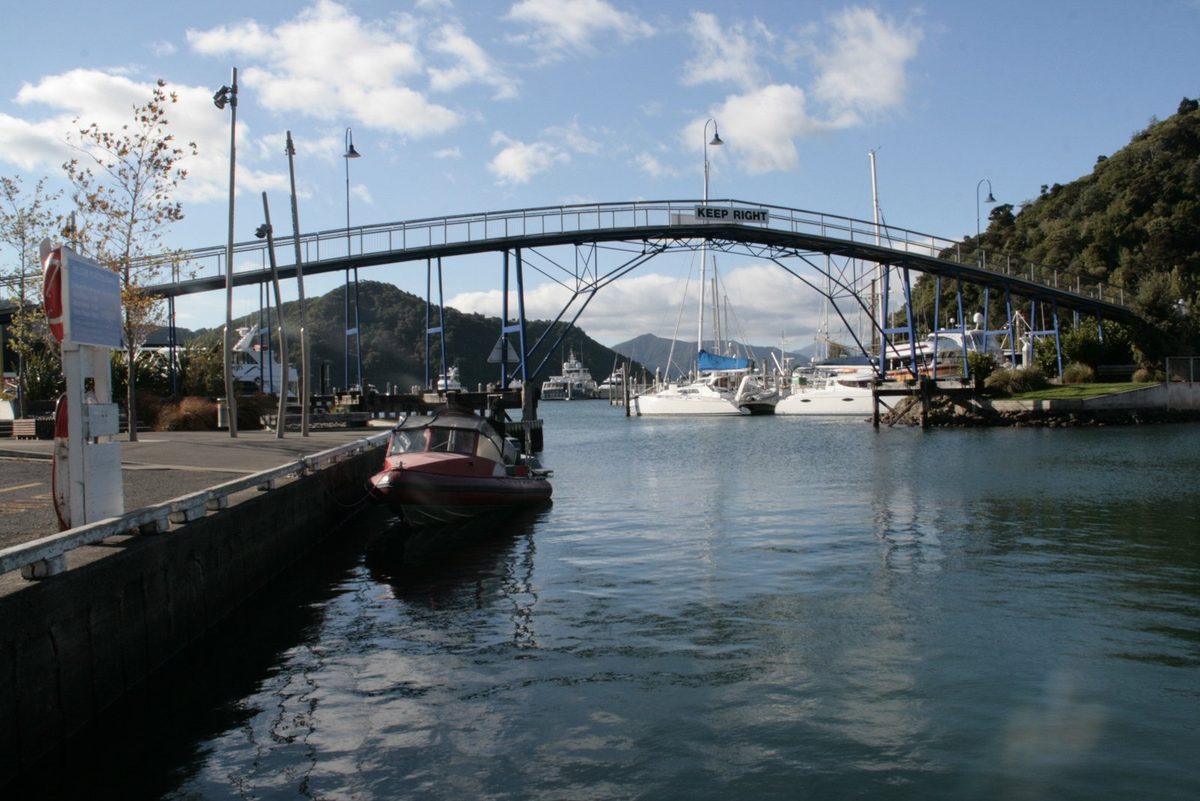 Picton's Coathanger pedestrian bridge crossing the marina inlet, a central part of the walk to Shelly Beach.
